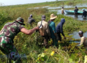 TNI-Polri Beserta Warga Sawaja Lakukan Pembersihan Aliran Sungai