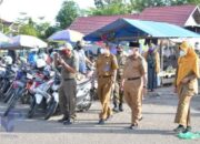 Tekan Penyebaran Covid-19, Bupati HSS Ikut Berikan Edukasi Prokes di Pasar Rakyat Terpadu