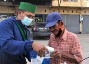 HUT ke-76 RI, HMI Banjarmasin Berbagi Masker dan Handsanitizer