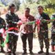 Kasrem 101/Antasari, Kolonel Inf Iwan Rosandriyanto didampingi Dandim 1003/HSS, Letkol Inf Nurliwedie Nurdin Kanan memotong pita peresmian hasil TMMD ke 117
