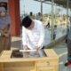 Bupati HSS, Achmad Fikry menandatangani prasasti peresmian mushalla Darul Fikry RS Daha Sejahtera.