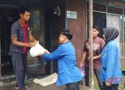 Terapkan Tri Motto, PC PMII HSS Bagikan Sembako Untuk Warga Desa Gambah Dalam