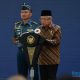 Wakil Presiden RI, Ma'Ruf Amin saat memberikan sambutan pada acara Universal Health Coverage (UHC) Award 2024.