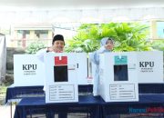 Hasnuryadi Sulaiman Gunakan Hak Suara Bersama Istri di TPS 08 Kampung Melayu