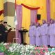 Bupati Tapin, H. Yamani saat mengukuhkan pengurus GOW Kabupaten Tapin masa bakti 2025-2030. (Foto : Prokopim Tapin)