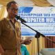 Sekda HSS, Muhammad Noor saat membacakan sambutan Bupati HSS, Syafrudin Noor pada kegiatan Workshop Pendampingan Tata Kelola Program Kesehatan. (Foto : Diskominfo HSS)