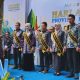 Gubernur Kalsel, Muhidin saat mengukuhkan Bupati HSS Syafrudin Noor dan istri beserta bupati/walikota se-Kalsel menjadi Ayah dan Ibu Forum Anak Daerah. (Foto : Narasi Publik)