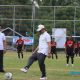 Sekda HSS, Muhammad Noor melakukan tendangan bola pertama tanda dimulainya Turnamen Sepak Bola U-40 Kapolsek Simpur Cup 2025. (Foto : Prokopim HSS)