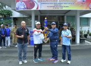 Semangat Porprov XII Kalsel, Wabup HSS Serahkan Api Obor ke Wabup Tala
