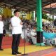 Wabup Tapin, H. Juanda memberikan sambutan pada acara peringatan Hari Santri Nasional 2025 di Lapangan Dwi Dharma Rantau. (Foto : Prokopim Tapin)