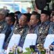 Bupati Tapin, H. Yamani dan Wakil Bupati H. Juanda saat menghadiri Puncak Harjad ke-60 Tanah Laut. (Foto : Prokopim Tapin)