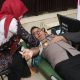 Kapolres HSU, AKBP Agus Nuryanto mengikuti kegiatan donor darah dalam rangka bakti kesehatan memperingati hari bhayangkara ke-80. (Dok. Istimewa)