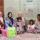 Bunda PAUD HSS Hj Mustaidah menyambangi rumah salah satu warga di Kelurahan Kandangan Barat. (Dok: Istimewa)