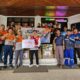 CSR Section Head PT AGM Widharto Ali menyerahkan bantuan 15 ribu masker secara simbolis kepada Ketua PMI Kabupaten HSS, Salahuddin. (Dok: Narasi Publik)