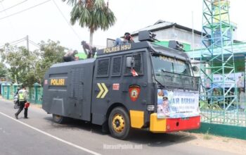 Gunakan Mobil Water Cannon, Polres HSU Salurkan Air Bersih ke Panti Asuhan. (Dok: Istimewa)