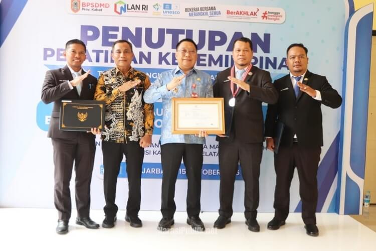 Wakil Bupati Tapin H Juanda saat menghadiri Penutupan PKN Tingkat II Angkatan XVIII Tahun 2026 dan peluncuran Banua Kalsel CorpU. (Dok: Prokopim Tapin)